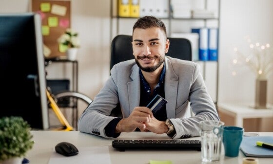 Young man working in his office