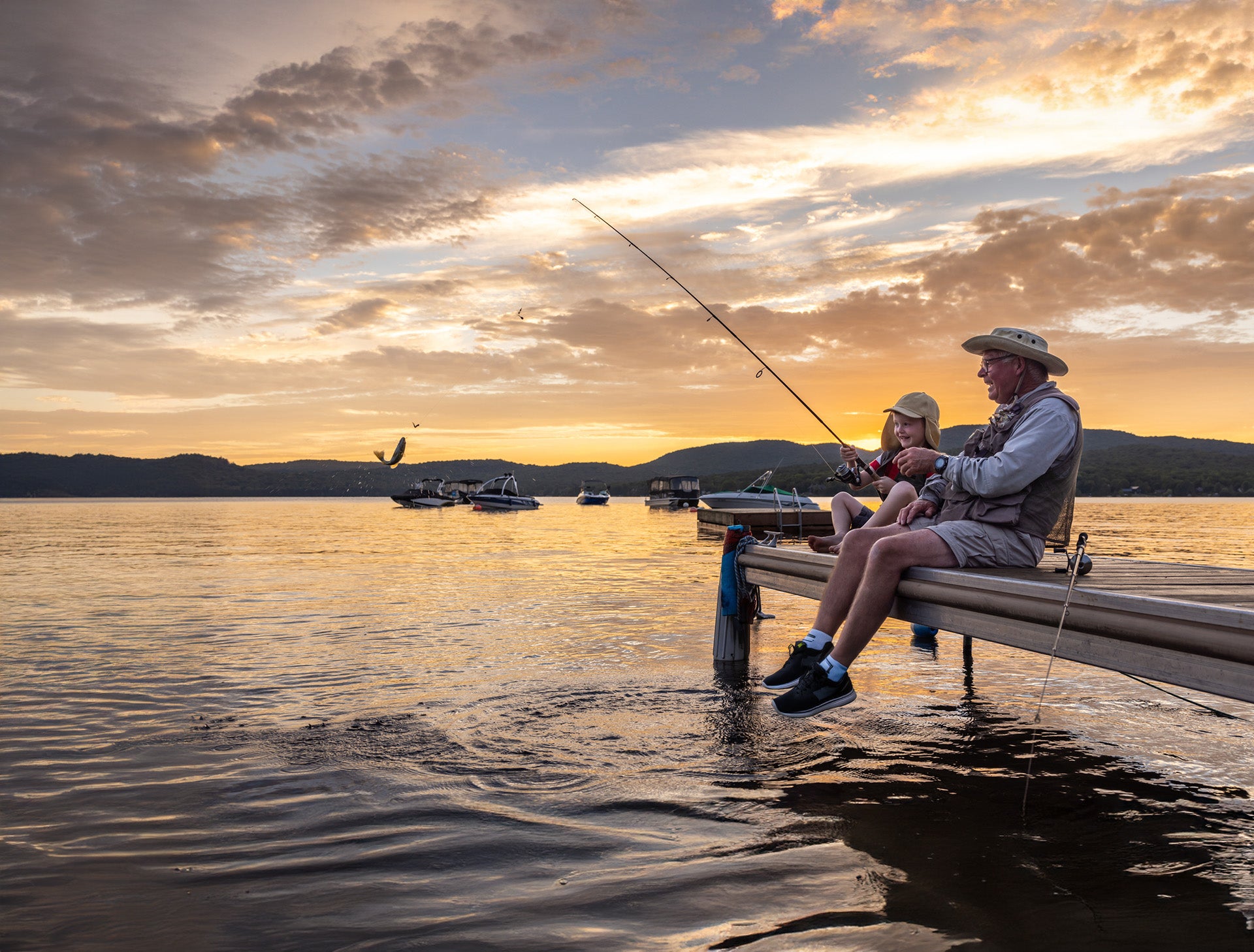 man sitting on the dock with a grandchild in tennessee