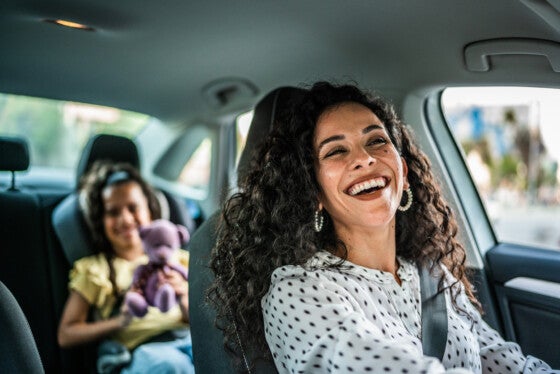 Mother and daughter talks in the car